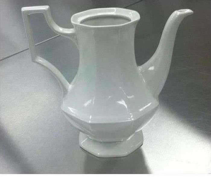 Soot covered Tea Kettle after