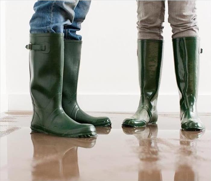 people with rubber boots